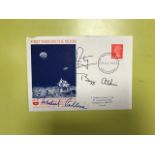 A 1960s First Man On The Moon First Day Cover, dated 21 July 1969, bearing three ink signatures,