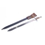 A Swiss 1914 sawback bayonet, by Elsener Schwyz, number 756879, complete with steel scabbard and