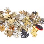 An assortment of approx 50 British cap badges, including North Irish Horse, 3rd City of London