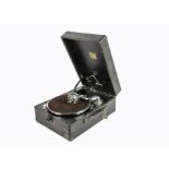 A portable gramophone, HMV Model C102H, in black case, with 5B soundbox, 1953 (working order but