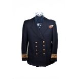 A mid 20th Century Captain (Masters) Merchant Naval uniform jacket, with five ribbons to the