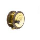 An Eaton & Deller brass and lacquered fishing reel, the 4?" reel with brass front, with makers