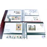 An extensive collection of First Day Covers, in 12 presentation folders, mainly 2000 onwards,