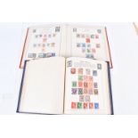 A collection of British and World stamps, including several Mint stamp examples, an album containing