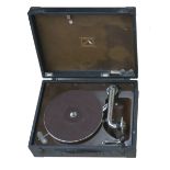 A portable gramophone, HMV Model 99, No. 99009748, with No. 16 soundbox and black case with label of