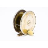 A Turnbull of Princess St Edinburgh brass and lacquered fishing reel, the 4¼" reel stamped to the