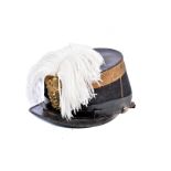 A 19th Century Italian Shako, with crossed keys badge with initials to front, white feather plume,