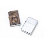 A 1996 Bosnia Bulldogs Zippo lighter, brushed chrome case with raised design to the front,