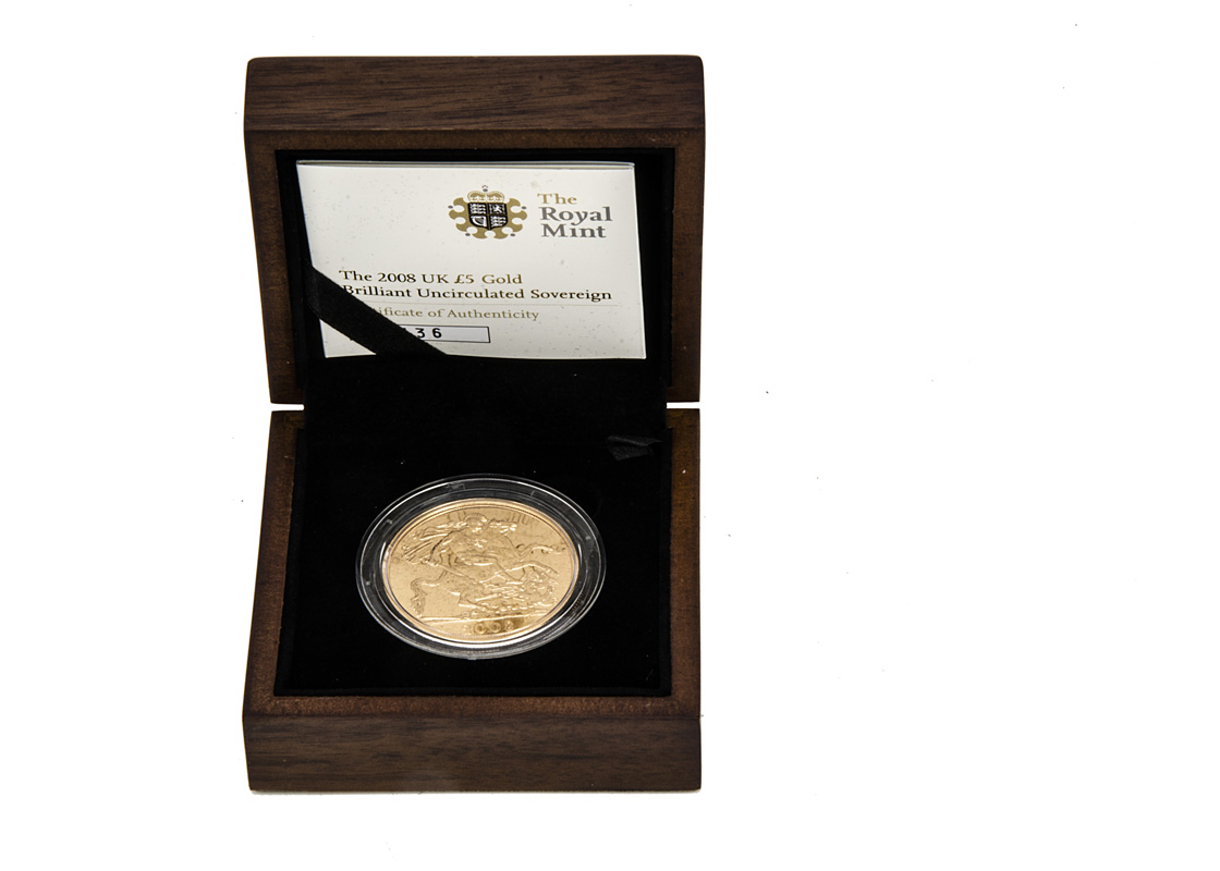 A modern Royal Mint The 2008 UK £5 Gold Brilliant Uncirculated Sovereign coin, in fitted box with