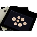A modern Royal Mint 2008 United Kingdom Coinage Royal Shield of Arms Proof Collection, seven gold