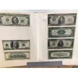 A folder of US and World bank notes, including two US $1000 and two $500, and others, also