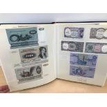 A folder of World bank notes, including some good Australian examples such as four $100, and more,