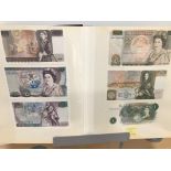 A folder of British and World bank notes, including two Gill £50, an O'Brien white £5, a consecutive