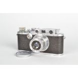 A Leitz Wetzlar Leica III Camera, serial no 135658, 1934, body F-G, small scuffs, rust spots,