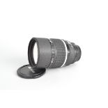 A Nikon AF DC 135mm f/2D Lens, serial no 304352, auto focus functions, barrel G-VG, some light