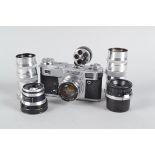 A Kiev 4A Type 2 Rangefinder Camera and Four Extra Lenses, camera serial no 7510707, body VG,