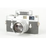 A Leitz Wetzlar Leica M2 Camera, chrome, serial no 988 705, 1960, body F-G, scratches, tarnishing to