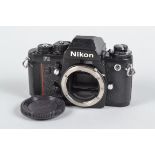 A Nikon F3 SLR Body, serial no 1 667 301, DE-2 eye level viewfinder, body F, brassing to edges,