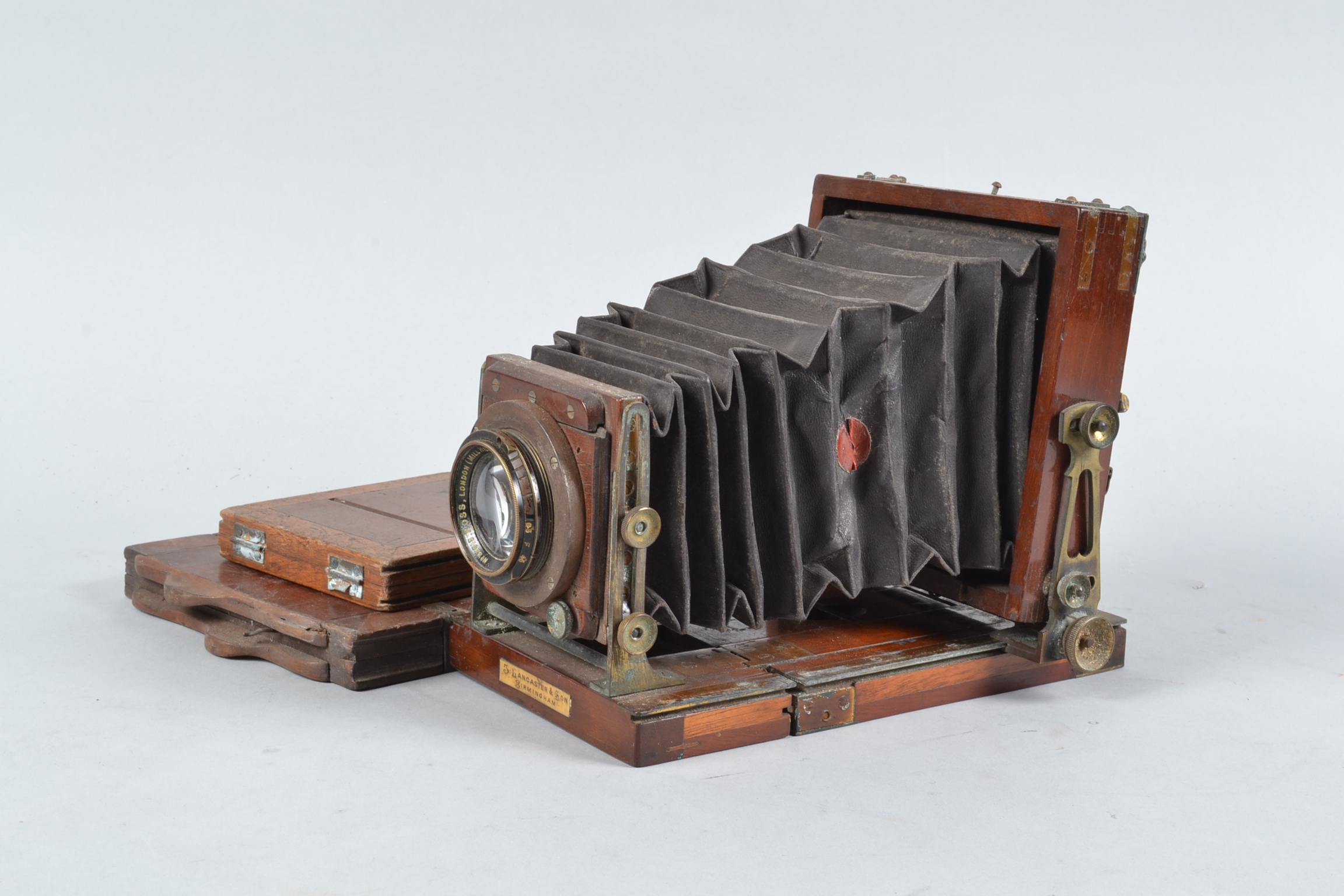 A Lancaster Special Instantograph Tailboard Quarter-Plate Camera, square-cornered black bellows,