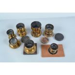 Seven Medium Brass Lenses, comprising a Krauss Paris Tessar 210mm f/4.5 lens, serial no a Ross 8½
