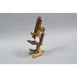 A Monocular Microscope, by R & J Beck London, serial no 28954, lacqurered brass, German style