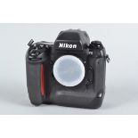 A Nikon F5 SLR Camera Body, serial np 3016170, powers up, shutter working, meter responsive, AF