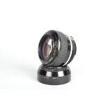 A Nikon Noct-Nikkor 58mm f/1.2 AI Lens, serial no 173678, barrel G, elements G-VG, with Nikon HS-9