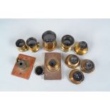 Ten Various Brass Lenses, including a Dallmeyer 5 x 4 Rapid Rectilinear lens, a Ross No 2 W.A.