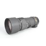 A Nikon ED AF Nikkor 300mm f/4 lens, serial no 225483, auto focus functions, barrel G, some
