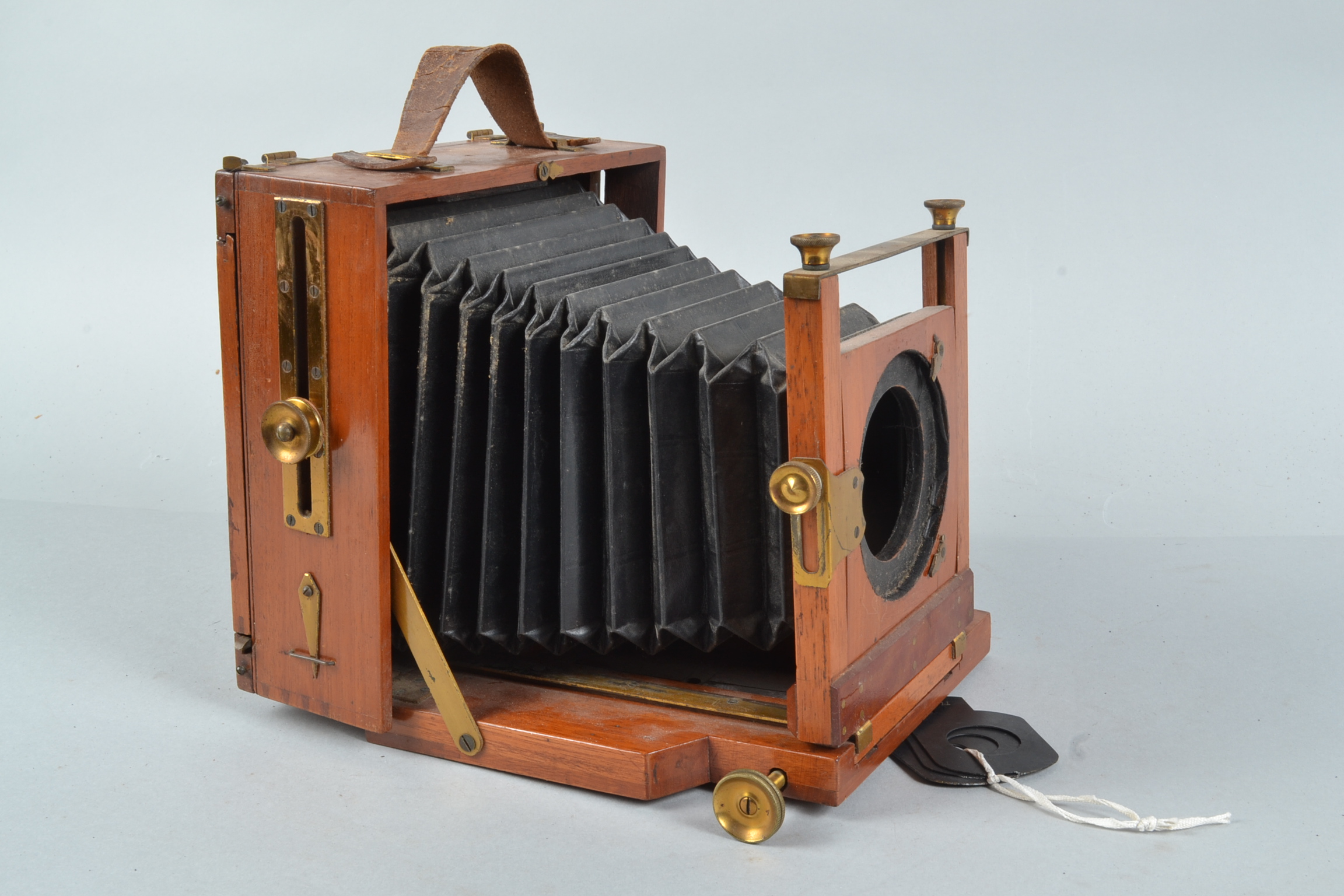 A Perken Son & Rayment Optimus Mahogany Field Camera Body, 6½ x 4¾in, chamfered tapered black