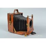 A Perken Son & Rayment Optimus Mahogany Field Camera Body, 6½ x 4¾in, chamfered tapered black
