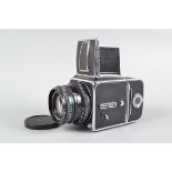 A Hasselblad 500CM SLR Camera, chrome, serial no UT 184728, body G, paint loss to tripod mount,