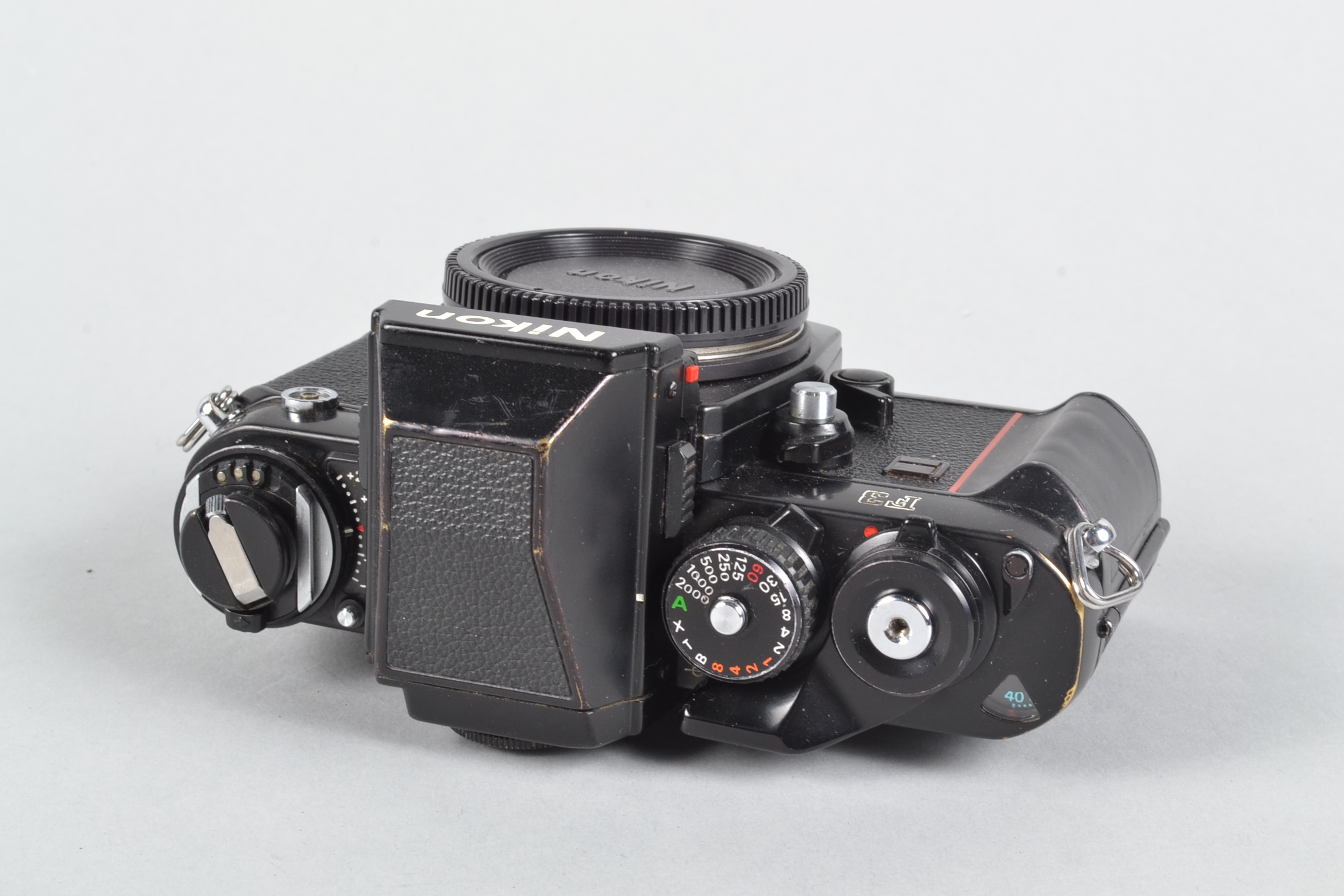 A Nikon F3 SLR Body, serial no 1 667 301, DE-2 eye level viewfinder, body F, brassing to edges, - Image 2 of 5