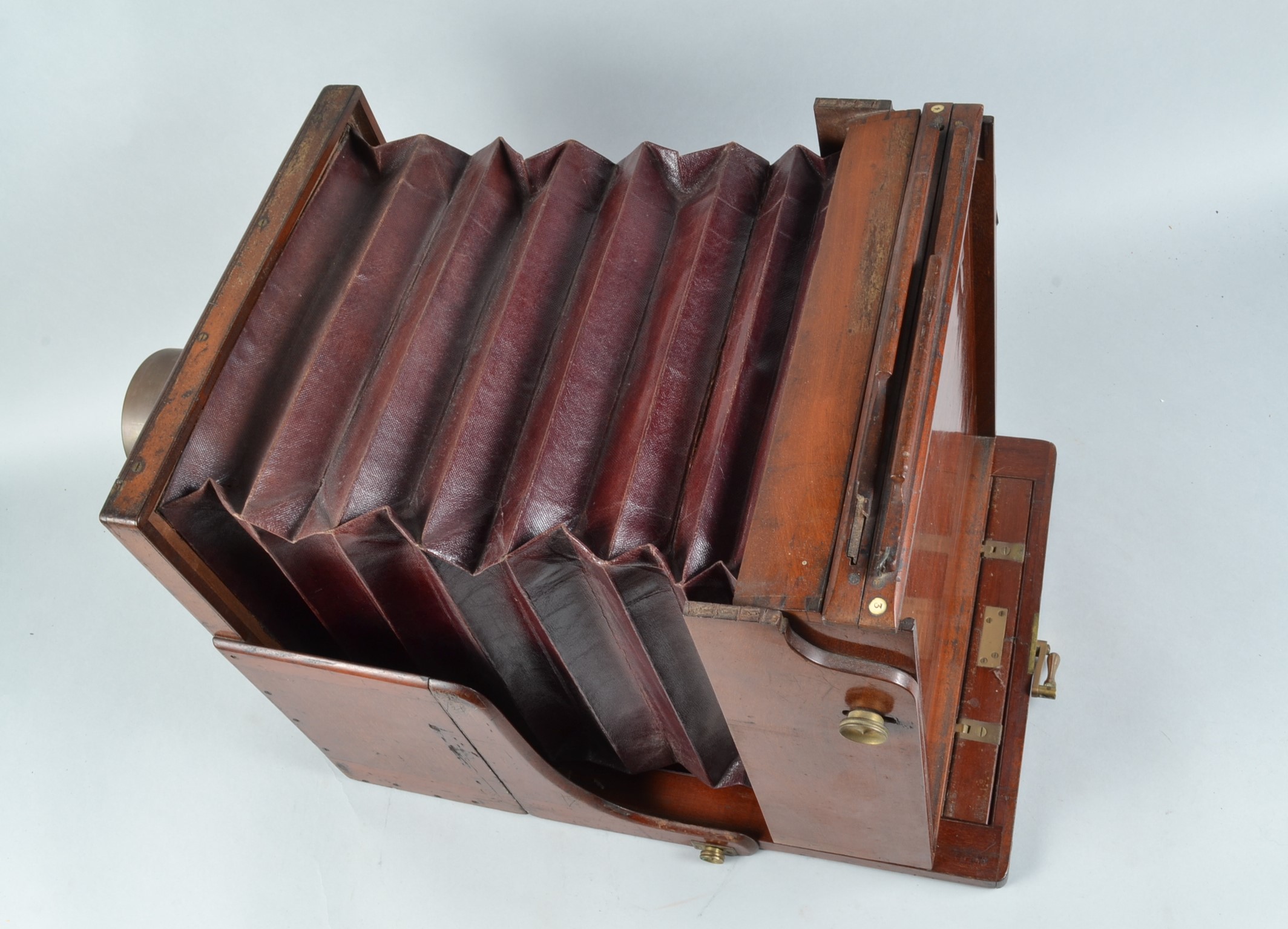 A Large Mahogany Tailboard Camera, 12 x 12in, square cornered, straight maroon bellows, no - Image 3 of 7