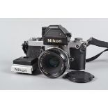 A Nikon F2S Photomic SLR Camera, serial no 7 811 932, DP-2 prism, body F-G, slight brassing to