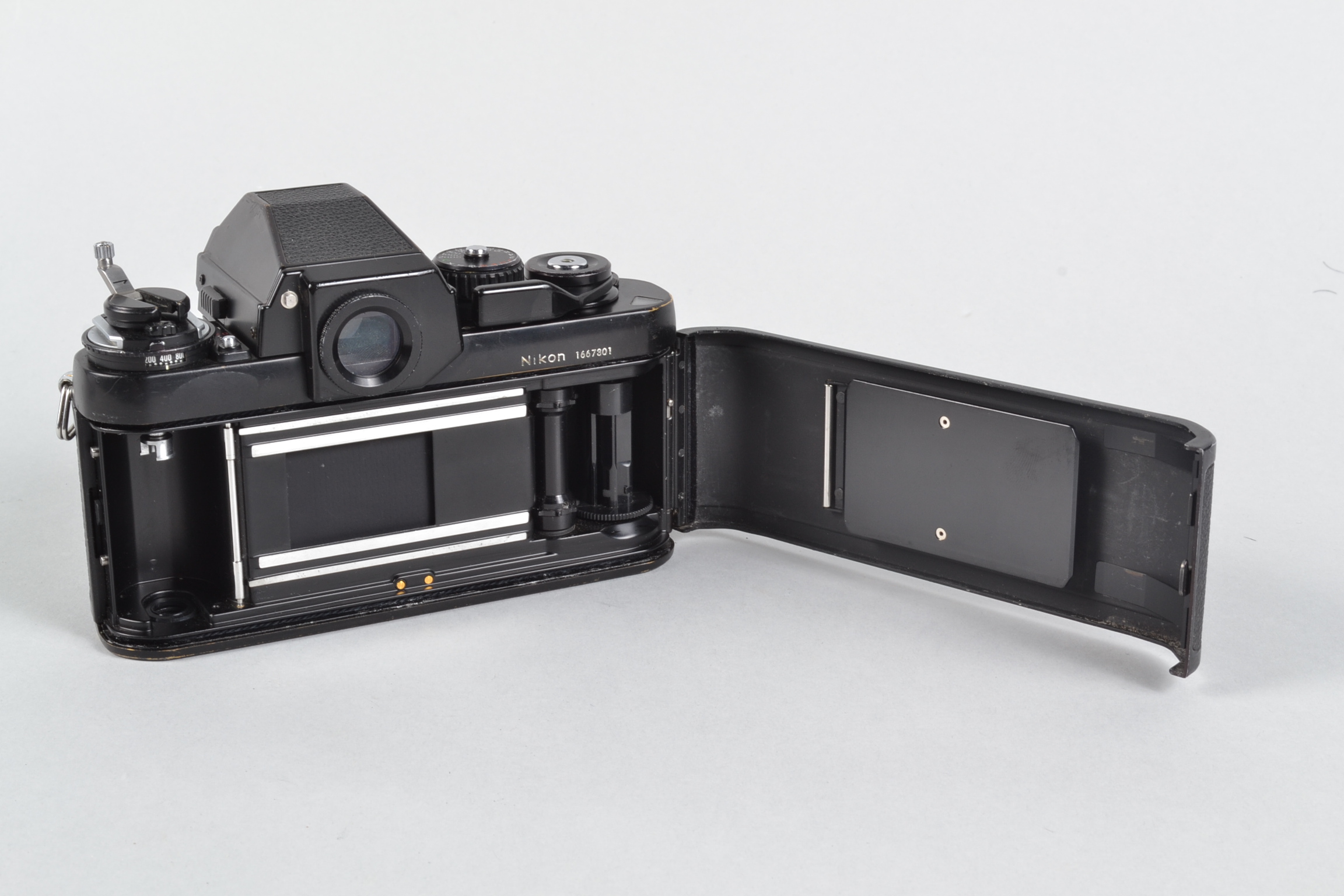 A Nikon F3 SLR Body, serial no 1 667 301, DE-2 eye level viewfinder, body F, brassing to edges, - Image 5 of 5