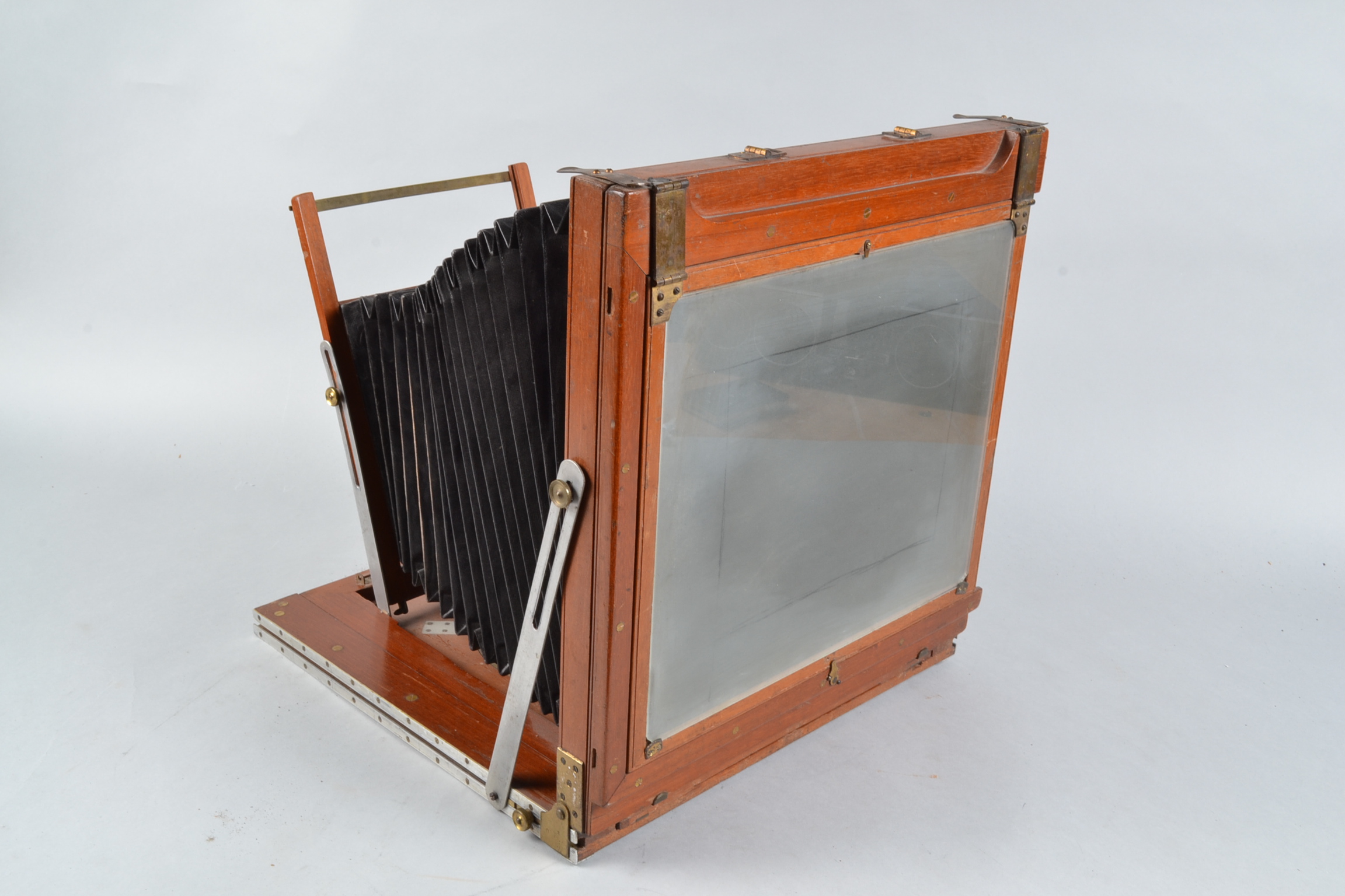 A 12 x 10in Mahogany Stand Camera, square-cornered tapered bellows, rear ground glass present, - Image 3 of 5