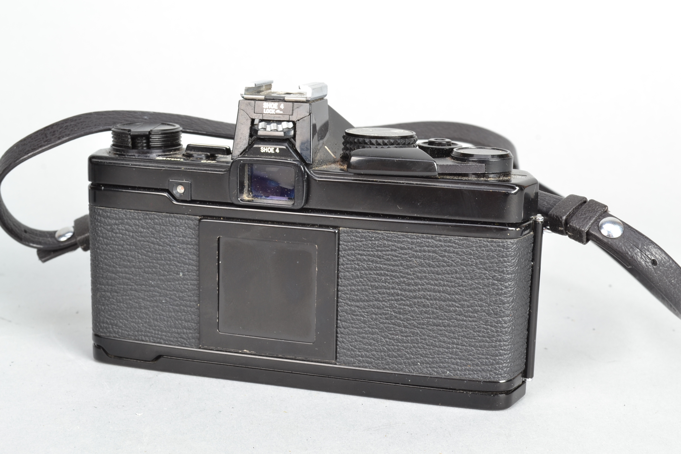 An Olympus OM2n Camera, black, serial no 1059132, body G, light scratches, light wear around strap - Image 5 of 8