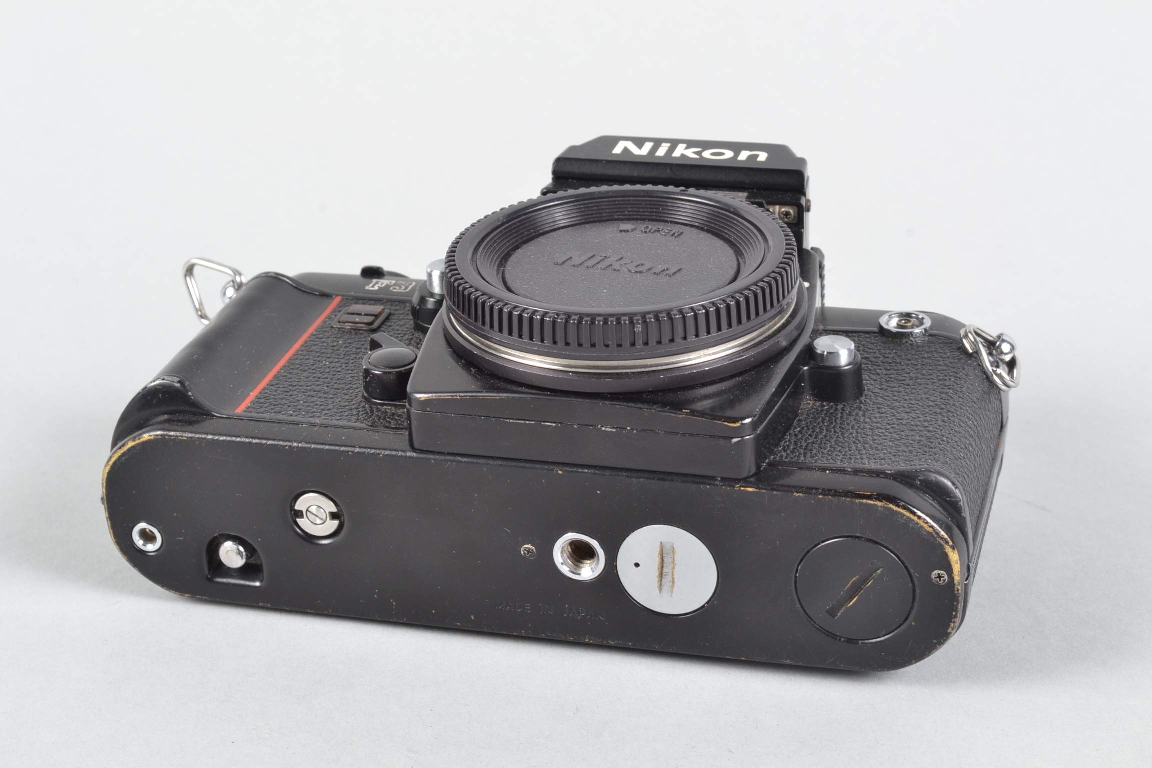 A Nikon F3 SLR Body, serial no 1 667 301, DE-2 eye level viewfinder, body F, brassing to edges, - Image 3 of 5