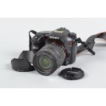 A Sony Alpha 77 DSLR Camera, battery and charger not present, untested, body G, slight wear, with