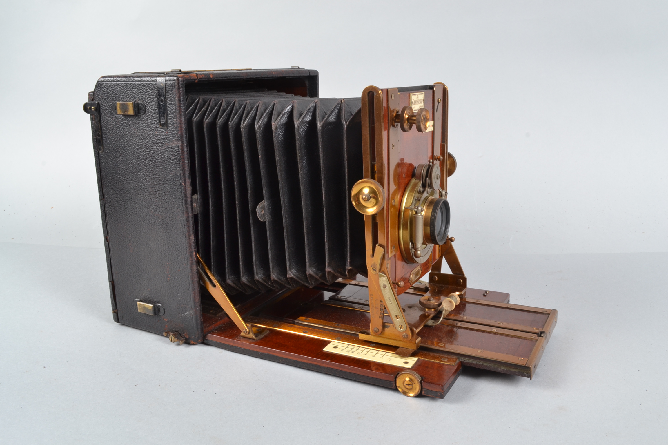 A Sanderson De Luxe Hand and Stand Camera, 6½ x 4¾in, made by Houghtons Ltd, serial no 20035, - Image 3 of 5