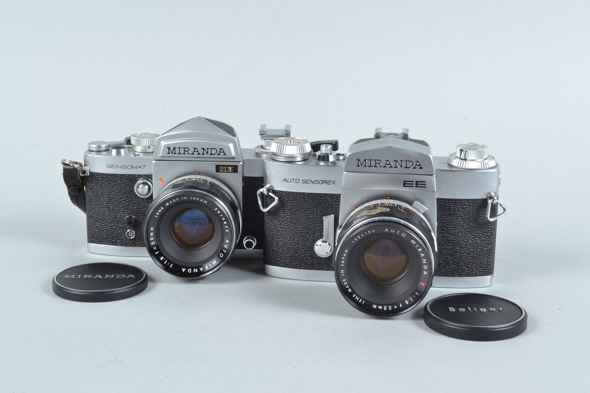 Two Miranda SLR Cameras, a Sensomat RE, shutter working, meter not working, body G-VG, with f/1.8
