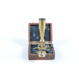 An early 19th Century Cary lacquered brass Gould's Improved Pocket Compound Microscope of small