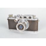 A Leitz Wetzlar Leica IIIa Camera, serial no 186903, 1936, body P-F, heavy wear and brassing,