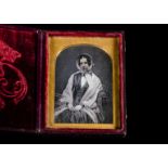 Mid-19th Century cased Portrait Daguerreotypes, quarter-plate of seated young lady, in bonnet,