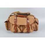 A Billingham 550 Camera Bag, khaki canvas, tan leather, olive interior with adjustable dividers, two