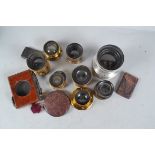 A Group of Small Brass Lenses, including a Busch Rapid Aplanat No 2, a Cooke Series III 5in, a