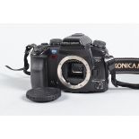 A Konica Minolta Dynax 7D DSLR Camera body, no charger present, untested, body G-VG, some marks,