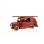 A Pre-War Dinky Toys 25k Streamlined Fire Engine, red body, tinplate base, six firemen, ladder,