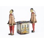 A Lehmann Tinplate No 723 Kadi (The Busy Coolies), depicts two Chinese figures carrying a Tea Chest,